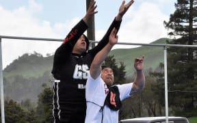 Two players from different marae playing netball at the Taihape Whānau Sport Day