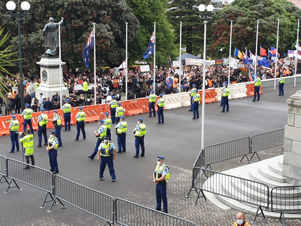 A large police presence is seen around parliament buildings in Wellington after people protesting against Covid-19 restrictions marched there.