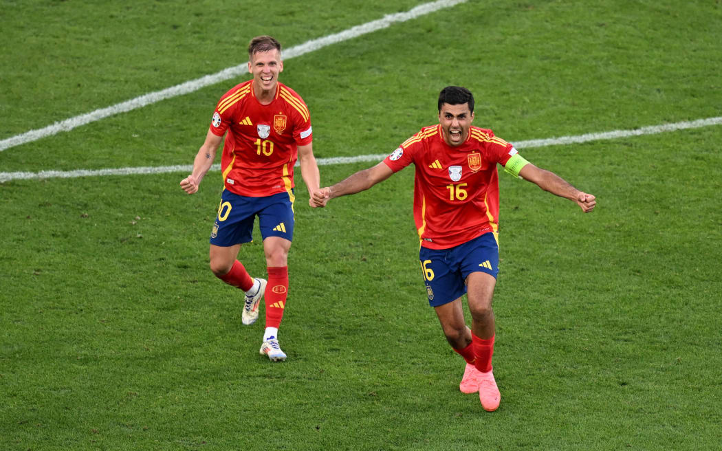 05 July 2024, Baden-Württemberg, Stuttgart: Soccer, UEFA Euro 2024, European Championship, Spain - Germany, final round, quarter-final, Stuttgart Arena, view into the arena. Spain's Dani Olmo (l) and Rodri celebrate victory. Photo: Bernd Weißbrod/dpa (Photo by BERND WEISSBROD / DPA / dpa Picture-Alliance via AFP)