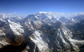 An aerial view of Mt Everest, centre, amid the Himalayan mountain range taken in 2013.