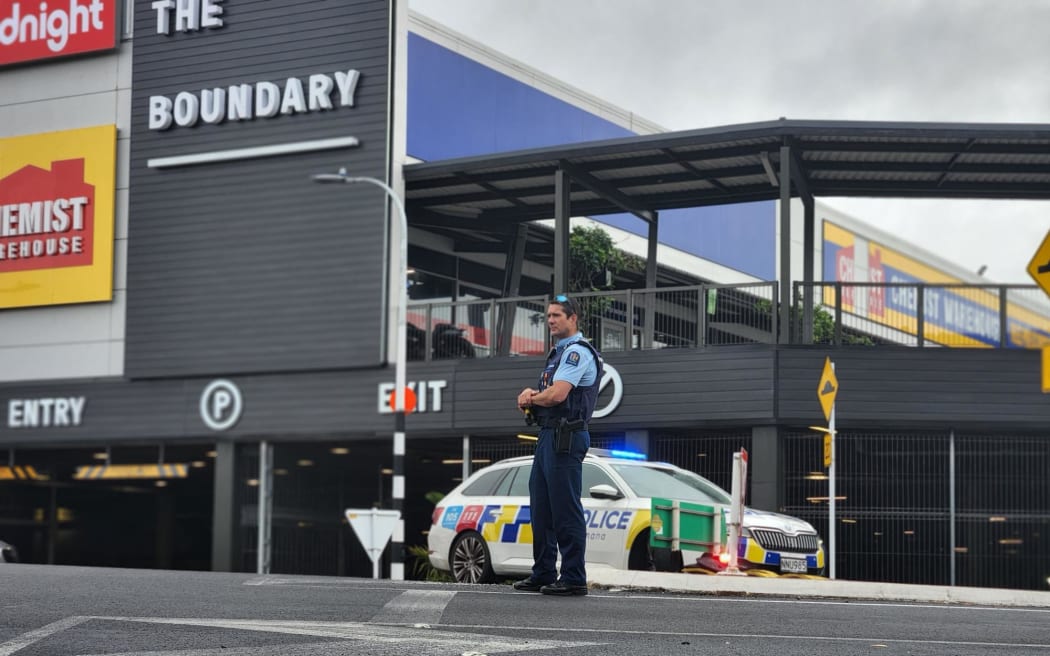 Police have also locked down a shopping complex near West City Waitākere.