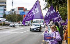Christchurch health workers protest holiday act payment delays outside hospital on 11 March 2024.