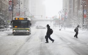 Detroit, in Michigan, was already dealing with a winter snowstorm.