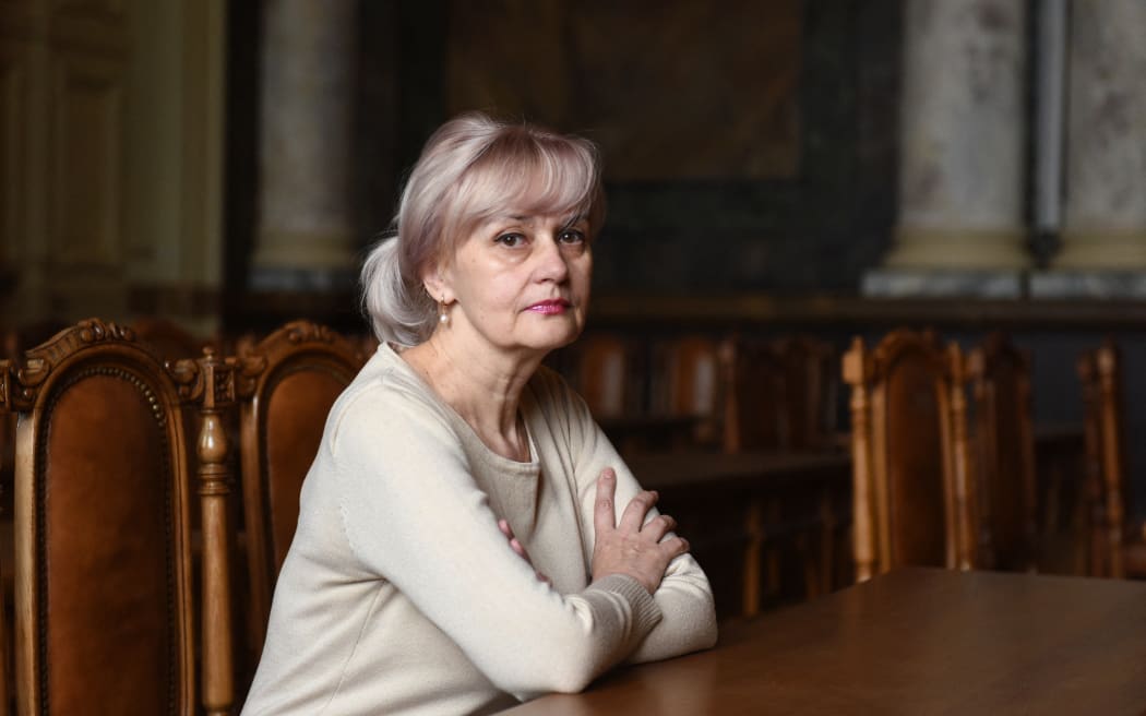 Professor and former lawmaker Iryna Farion, who gives online Ukrainian language classes, poses in the western Ukrainian city of Lviv on April 5, 2022. In Lviv, where the national language is predominant, a group of academics is offering free lessons online to those around the country wishing to brush up on their Ukrainian speaking skills. A sizeable minority of Ukrainians speak Russian as their mother tongue, and many more are fluent, but in recent years, increasingly more people have decided to shift linguistic identity in rejection of Russia's politics. Since Russia launched a military invasion on Ukraine in late February, under the pretext of "de-nazifying" its neighbour and protecting Russian speakers there, the trend has soared. (Photo by Yuriy Dyachyshyn / AFP)