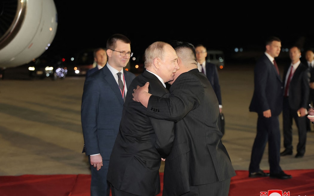 North Korea leader Kim Jong Un welcomes Russia President Vladimir Putin upon his arrival at Pyongyang International Airport in the North Korean capital.