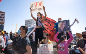 Demonstrators take to the streets of Atlanta to show support for Asian and Pacific Islander communities on March 20, 2021 in Atlanta, Georgia, after a series of shootings at three spas.