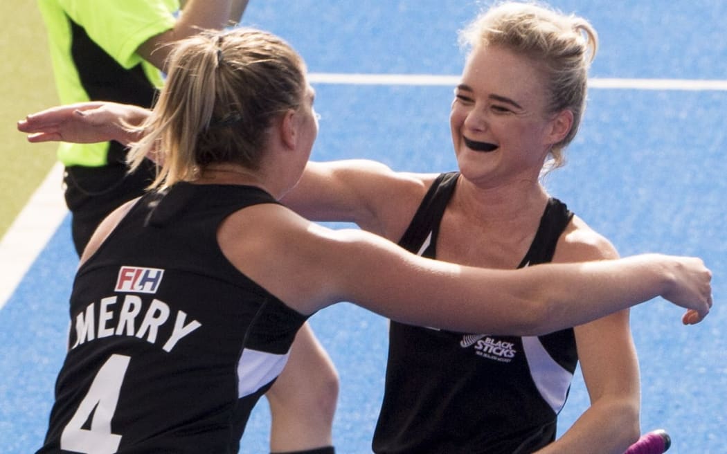 Olivia Merry and Charlotte Harrison celebrate the goal.