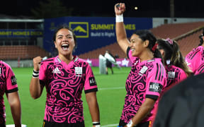 Stacey Fluhler celebrates..