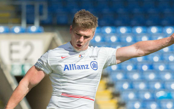 Saracens' Owen Farrell kicking for goal.