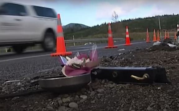 Road cones mark the site of the collision on Sunday in which seven people died.