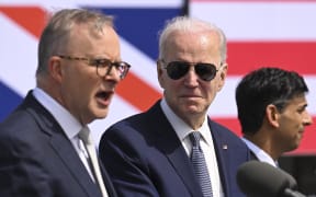 US President Joe Biden (C), British Prime Minister Rishi Sunak (R) and Australian Prime Minister Anthony Albanese (L) hold a press conference during the AUKUS summit on March 13, 2023, at Naval Base Point Loma in San Diego California. - AUKUS is a trilateral security pact announced on September 15, 2021, for the Indo-Pacific region. (Photo by Jim WATSON / AFP)