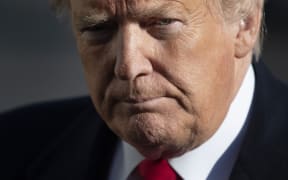 US President Donald Trump speaks as he arrives at the White House in Washington, DC, on January 6, 2019, after meetings at Camp David.