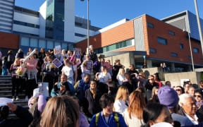 Hundreds of nurses march to Civic Square after gathering outside Wellington Hospital at the beginning of their strike.