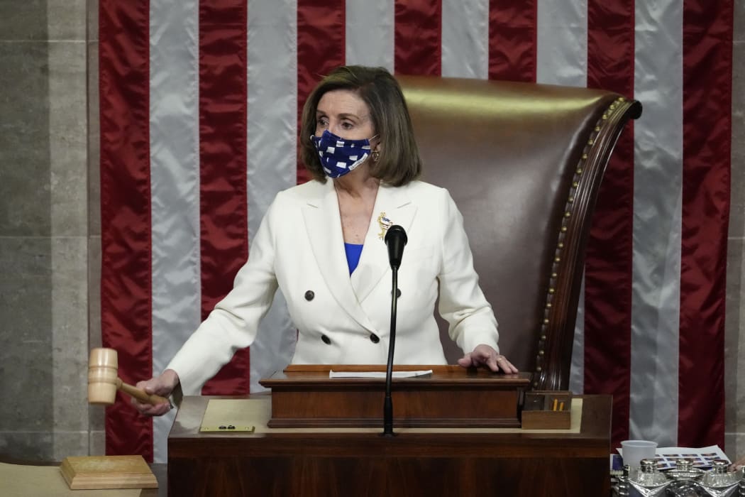 Speaker of the House Nancy Pelosi raps her gavel after the House voted to pass coronavirus relief package.