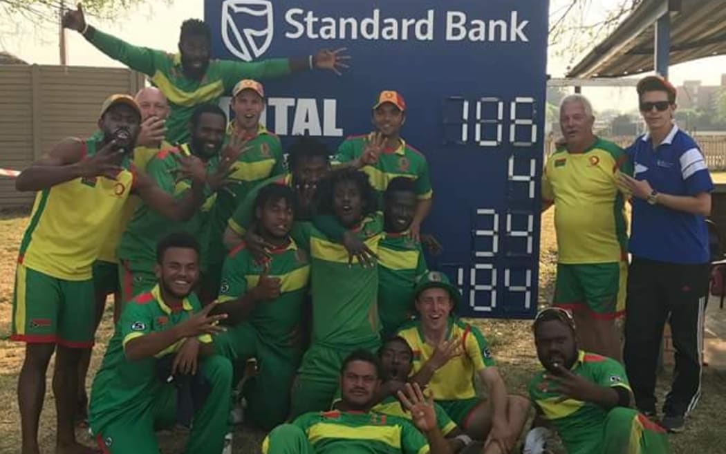 Vanuatu celebrate their win over Italy.