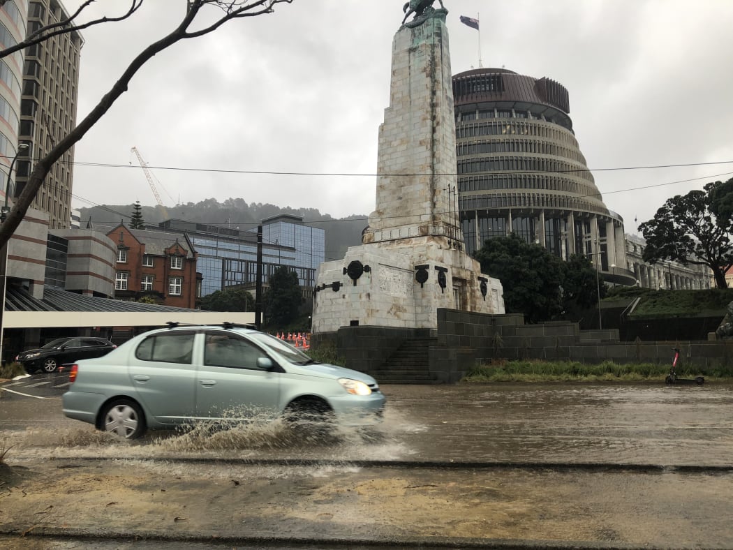 A car drives through water in Wellington