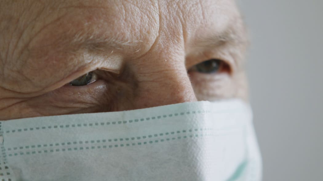 Senior man with medical mask. Prevention of the coronavirus Covid-19 spread.