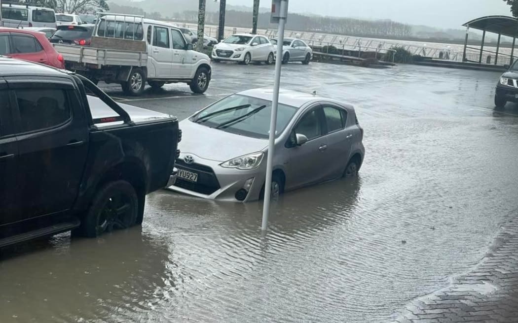 Rain and high tide combined earlier today to cause surface flooding in Dargaville township.
