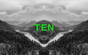 Podcast episode image for the 'Mr Lyttle Meets Mr Big' podcast. A moody black and white landscape photograph of the Whanganui river is mirrored vertically creating a Rorschach like effect with the episode number 'TEN' overlaid in vibrant green.