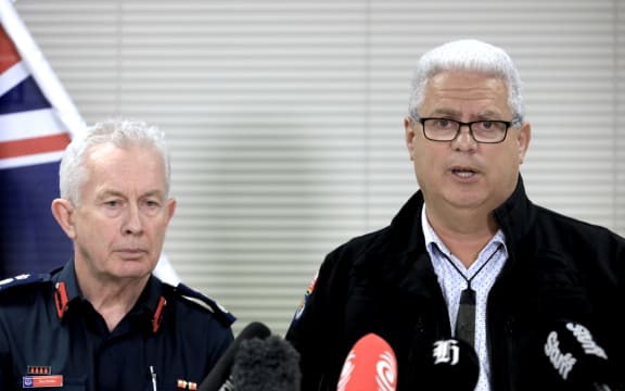 Fire and Emergency (FENZ) chief executive Kerry Gregory (centre) gives an update on the Muriwai incident, where two brigade volunteers became trapped after a house collapsed during Cyclone Gabrielle.