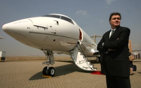The disputed assets include a Bombardier Global 5000 jet, similar to the one pictured.