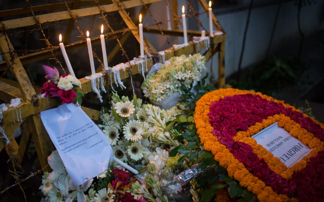 People have paid tribute to the Gulshan attack victims on the street where the attack was carried out.