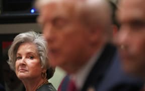 White House Chief of Staff Susie Wiles (L) looks on as US President Donald Trump (C) meets with unseen Ukrainian President Volodymyr Zelensky in the Cabinet Room of the White House in Washington, DC, on October 17, 2025. (Photo by TOM BRENNER / AFP)