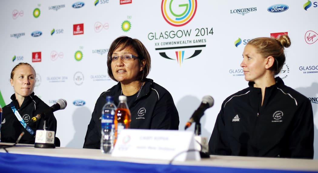 New Zealand netballers Laura Langman, left, and Casey Kopua, right, with coach Waimarama Taumaunu in Glasgow.