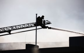 Firefighters battle a blaze that broke out at Maui campervan rental facility in Māngere, South Auckland on the morning of 3 September.