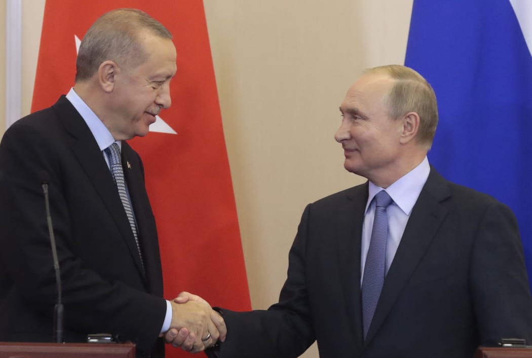 Russian President Vladimir Putin (R) and his Turkish counterpart Recep Tayyip Erdogan shake hands during a joint press conference following their talks in the Black sea resort of Sochi.