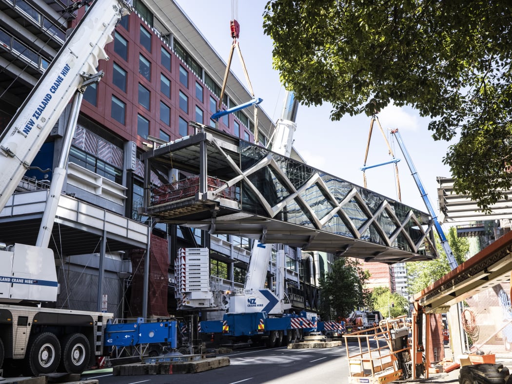 Bridge being craned into position between NZICC Horizon Hotel and SkyCity on 24 October, 2020.