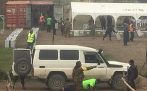 Papua New Guinea election polling officers being made to do push-ups by security forces in Banz, Jiwaka province.