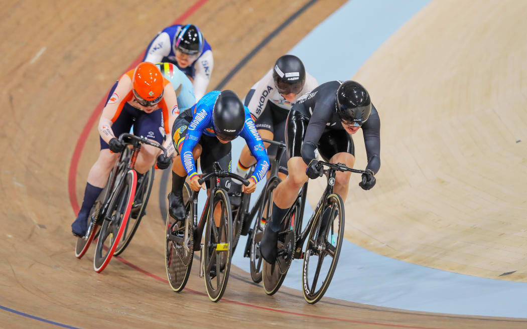 Ellesse Andrews of New Zealand leads Martha Bayona Pineda of Colombia, Hetty van der Wouw of The Netherlands in the women's keirin final at 2023 World Cycling Championships.