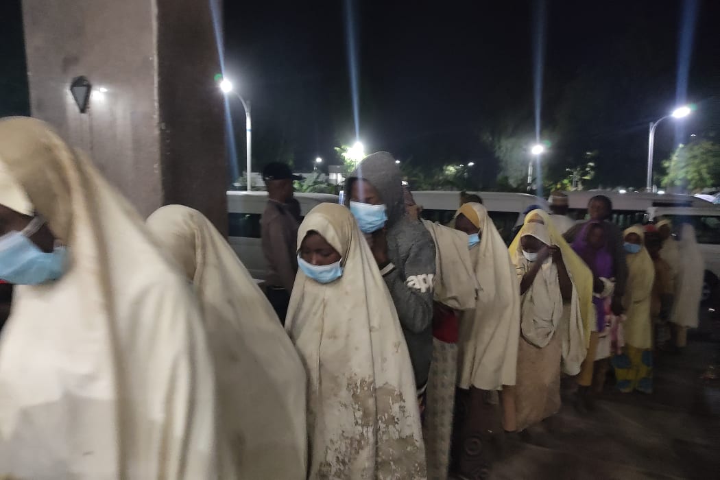 A group of girls previously kidnapped from their boarding school in northern Nigeria arrive on March 2, 2021 at the Government House in Gusau, Zamfara State upon their release.