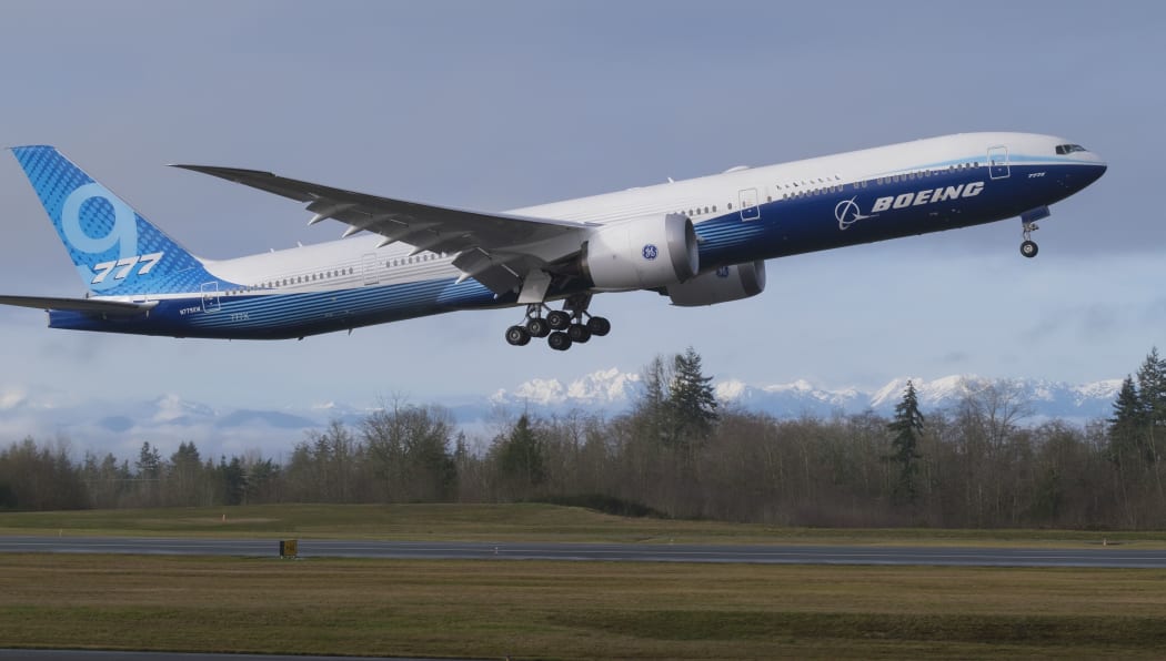 EVERETT, WA - JANUARY 25: A Boeing 777X airliner lifts off for its first flight at Paine Field on January 25, 2020 in Everett, Washington.