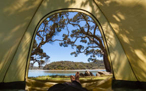 view of ocean from a tent