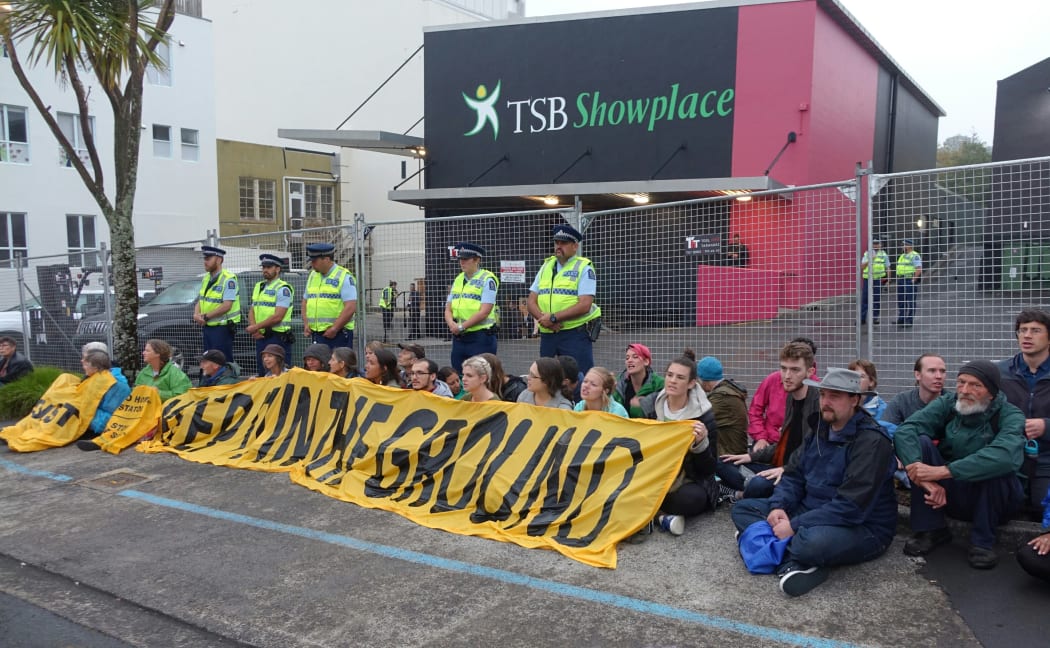 Protesters block the entrance to the TSB Showplace, New Plymouth, where the NZ Petroleum Conference is being held.