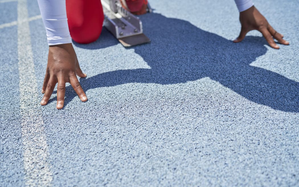 Close-up of hands of female track and field athlete at starting block. (Photo by Trevor Adeline/CAIA IMAGE/SCIENC / NEW / Science Photo Library via AFP)