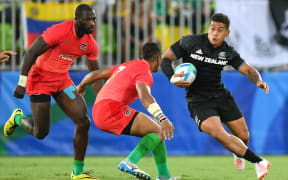 New Zealand's Augustine Pulu in the  sevens match against Kenya.