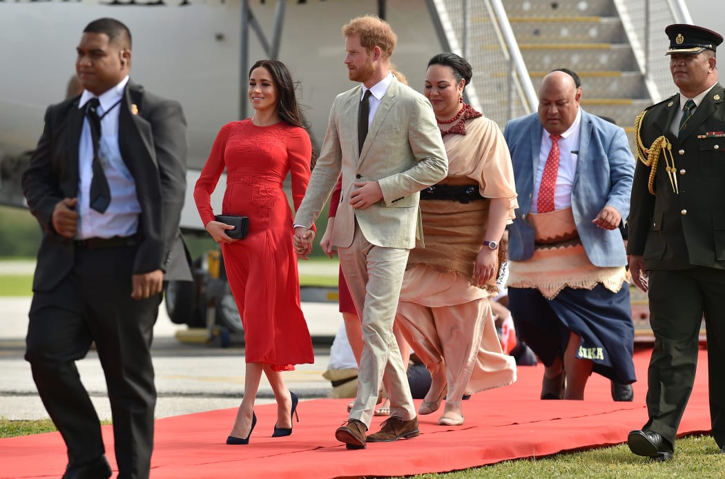Britain's Prince Harry and his wife Meghan, Duchess of Sussex arrive at Fua'amotu airport in Tonga.