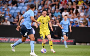 Bozhidar Kraev of Wellington Phoenix in action against Sydney FC, 2023.