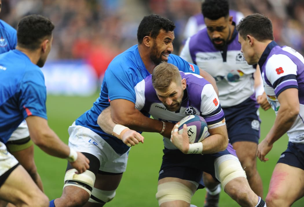Samoa lock Josh Tyrell tackled Scotland's John Barclay during the 2017 End of Year Tour.