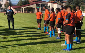 Fiji coach Vern Cotter issues instructions during training.