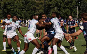 Fijian Drua players defend against the Rebels in Melbourne on Friday. Photo: Fijian Drua