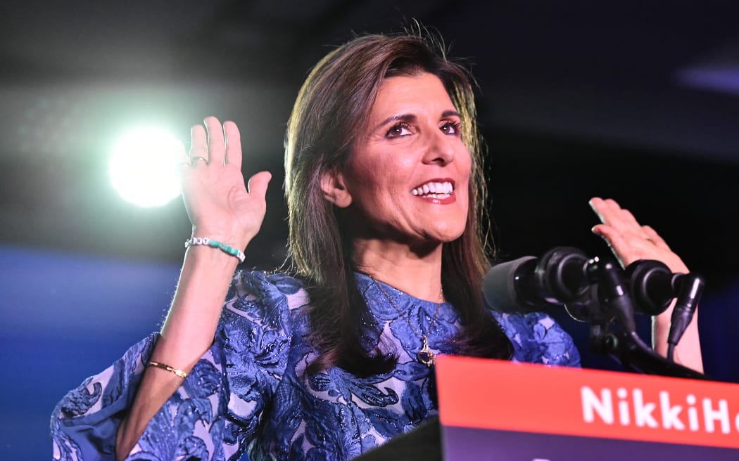Republican presidential hopeful and former UN Ambassador Nikki Haley speaks after results came in for the New Hampshire primaries during a watch party in Concord, New Hampshire, on January 23, 2024. Nikki Haley sought to warn Republican voters away from rival Donald Trump after he defeated her in Tuesday's New Hampshire primary, saying nominating the controversial US ex-president would spell victory for Joe Biden in November. (Photo by Joseph Prezioso / AFP)