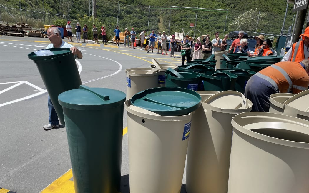 People waited hours in the hot sun to purchase discounted 200-litre water tanks at the southern landfill's Tip Shop on Tuesday in Wellington.