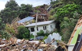 Slips, house damage in Karekare in West Auckland caused by Cyclone Gabrielle