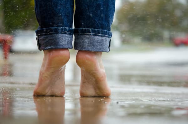 ​Foot specialists recommend allowing your feet and legs to adapt gradually to a barefoot lifestyle by increasing shoeless stints over several months, according to National Geographic.