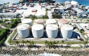The Marshalls Energy Company's fuel tank farm, foreground, was constructed on the reef using landfill in Majuro, the capital of the Marshall. A Supreme Court ruling declaring it government property is a key issue in a court case to invalidate a 2008 law that automatically makes reclaimed land property of private landowners.