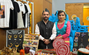 A couple in traditional Uttarakhand dress at Herala festival in Auckland